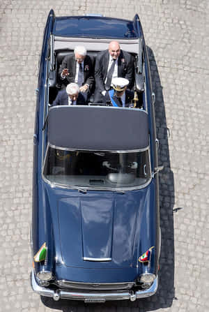 Vintage Blue Convertible Aerial View Wallpaper