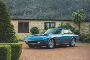 Vintage Blue Lamborghini Islero Parked Wallpaper