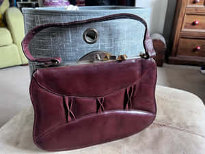 Vintage Burgundy Leather Handbag Wallpaper