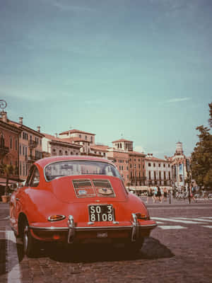 Vintage Car In European Square.jpg Wallpaper