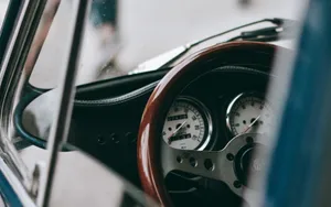 Vintage Car Steering Wheeland Dashboard Wallpaper