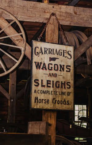 Vintage Carriages Wagons Sleighs Sign Wallpaper