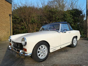 Vintage Charm - The Iconic Mg Midget Wallpaper