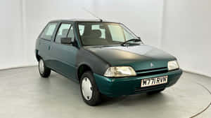 Vintage Citroen A X Green Hatchback Wallpaper
