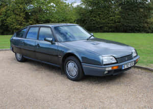 Vintage Citroen C X Parked Outdoors Wallpaper