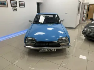 Vintage Citroen G S Blue Car Showroom Wallpaper