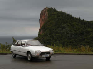 Vintage Citroen G S Near Cliffside Wallpaper
