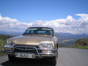 Vintage Citroen G S On Mountain Road Wallpaper