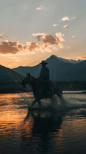 Vintage Cowboy At Sunset Wallpaper