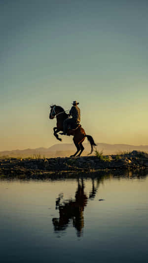 Vintage Cowboy On Horseback Wallpaper