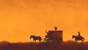 Vintage Cowboy Sunset Ride Wallpaper