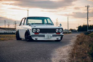 Vintage Datsun 510 On The Road Wallpaper