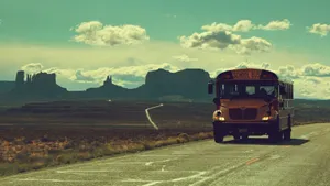 Vintage Desktop School Bus On Road Wallpaper