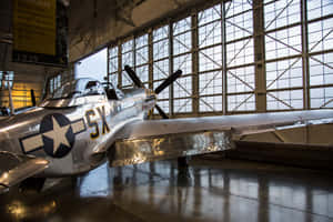 Vintage Fighter Plane Museum Exhibit Wallpaper