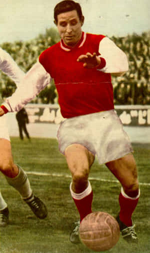 Vintage Footballer Action Shot Wallpaper