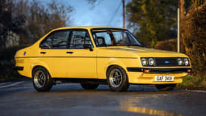 Vintage Ford Escort In Pristine Condition Wallpaper