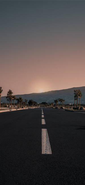 Vintage Iphone Wallpaper - Picturesque Long Road And Mountain Wallpaper