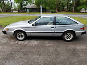 Vintage Isuzu Impulse Side View Wallpaper