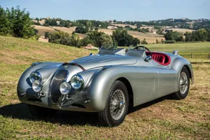 Vintage Jaguar X K120 Roadster Countryside Wallpaper