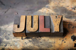 Vintage July Block Letters Wallpaper