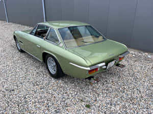 Vintage Lamborghini Islero Green Side View Wallpaper