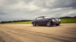 Vintage Lancia Aurelia Speedingon Track Wallpaper
