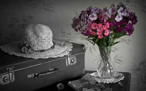 Vintage Luggageand Hatwith Flowers Wallpaper