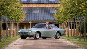 Vintage Maserati Mexico Coupe Rural Setting Wallpaper