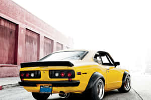 Vintage Mazda Rx-3: Classic Speed And Style Wallpaper