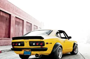 Vintage Mazda Rx-3: Classic Speed And Style Wallpaper
