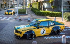 Vintage Mazda Rx-3 In Action Wallpaper