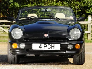 Vintage Mg Rv8 - A Synonym For British Classic Sports Car Charm Wallpaper