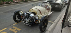 Vintage Morgan 3 Wheeler On The Open Road Wallpaper