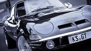 Vintage Opel Gt - A Touch Of Classic Elegance Wallpaper