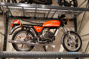 Vintage Orange Laverda Motorcycle Display Wallpaper