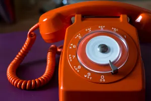 Vintage Orange Rotary Phone Wallpaper