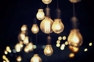 Vintage Pendant Lights Glowing Bokeh Background Wallpaper