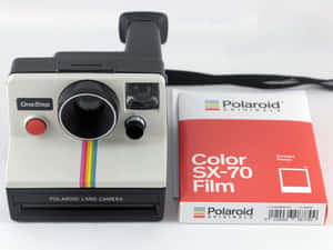 Vintage Polaroid One Step Camerawith S X70 Film Wallpaper