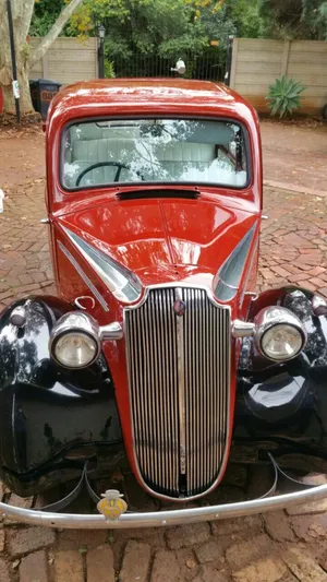 Vintage Red Lancia Aprilia Front View Wallpaper