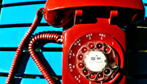 Vintage Red Rotary Phone Wallpaper