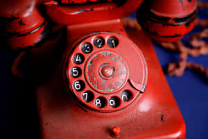 Vintage Red Rotary Telephone Wallpaper