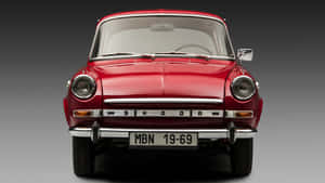 Vintage Red Skoda1000 Mb Front View Wallpaper