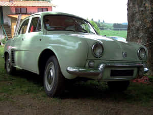 Vintage Renault Dauphine In Pristine Condition Wallpaper