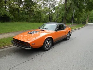 Vintage Saab Sonett On A Bright Sunny Day Wallpaper