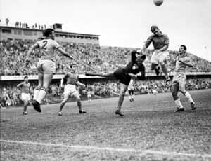 Vintage Soccer Match Action Wallpaper