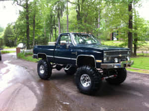Vintage Square Body Truck In Pristine Condition Wallpaper