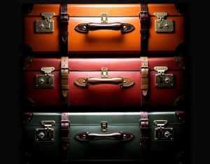 Vintage Suitcase Stack Display Wallpaper