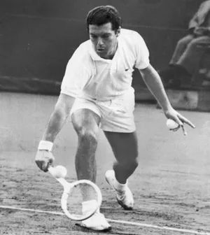 Vintage Tennis Player Action Shot Wallpaper