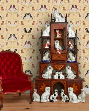 Vintage Toy Dog Collectionand Red Chair Wallpaper