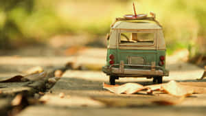 Vintage Toy Van On Tracks Wallpaper